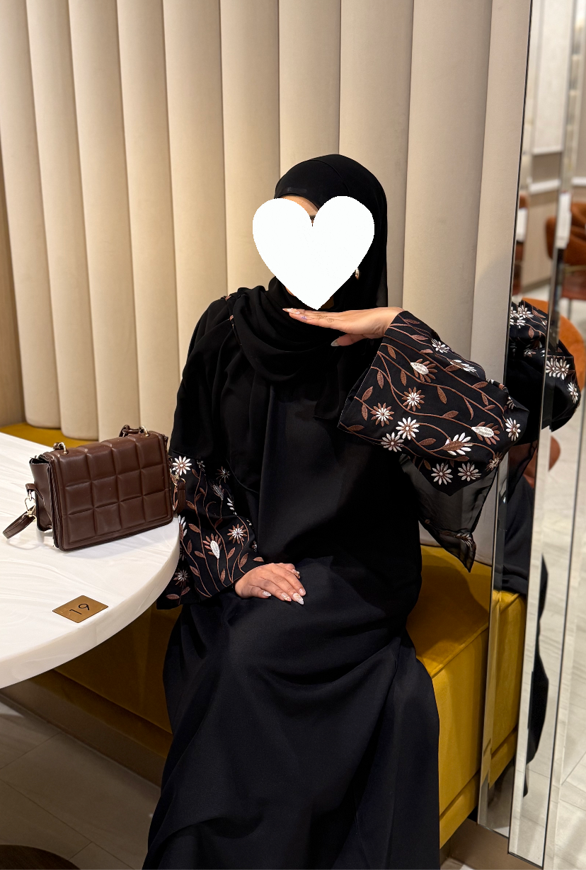 Black abaya with brown embroidered sleeves and hijab